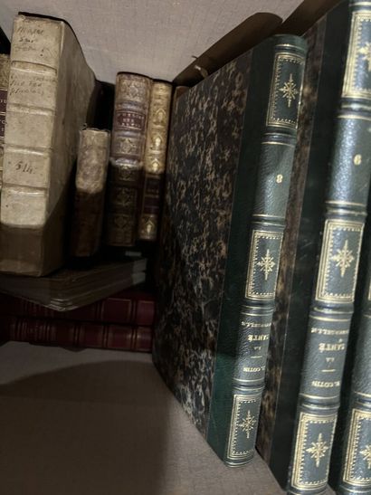 Bound and paperback books.
Eight boxes.
