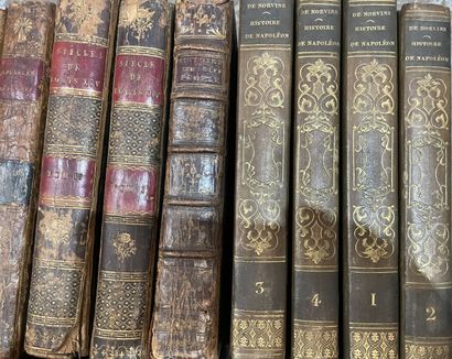 Bound and paperback books. 
4 boxes