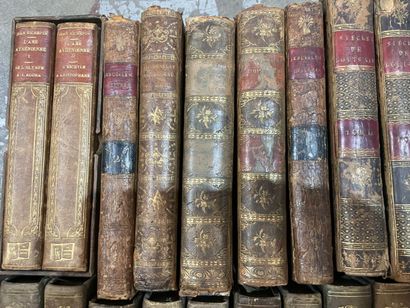 Bound and paperback books. 
4 boxes