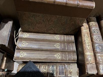 Bound and paperback books.
Eight boxes.
