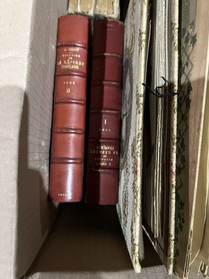 Bound and paperback books.
Eight boxes.