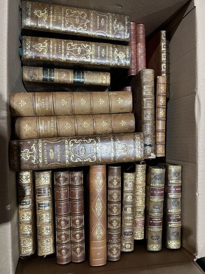 Bound and paperback books.
Eight boxes.