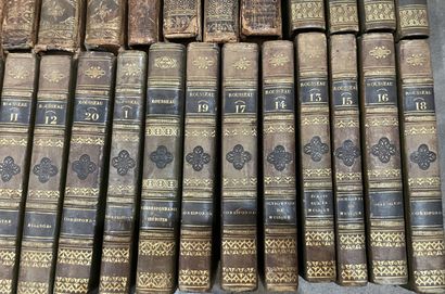 Bound and paperback books. 
4 boxes