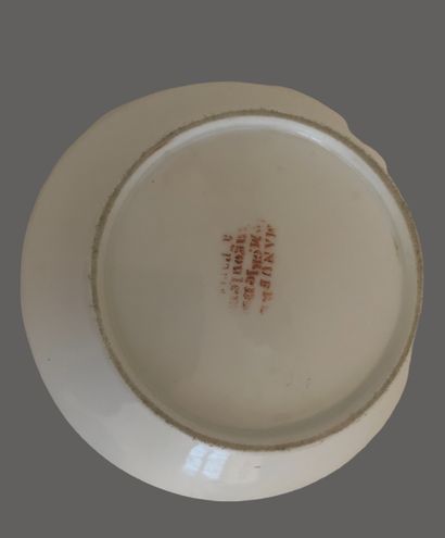 Service tête à tête en porcelaine à décor...