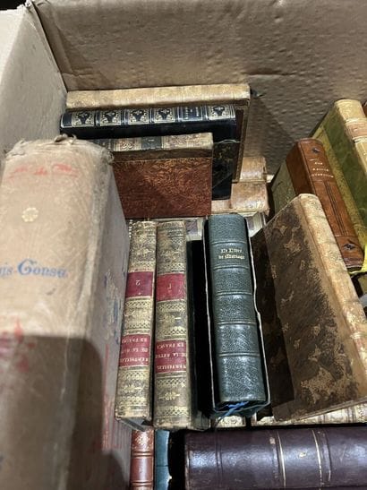 Bound and paperback books.
Eight boxes.