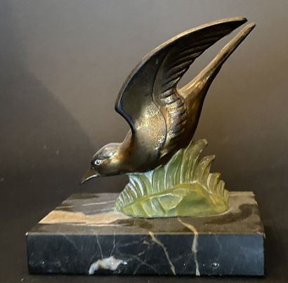 Serre-livres en bronze à patine doré et émaillé...