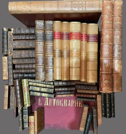 Bound and paperback books. 
4 boxes