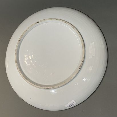 Plat en porcelaine à décors en camaïeu bleu...