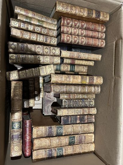 Bound and paperback books.
Eight boxes.