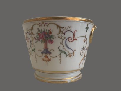 Service tête à tête en porcelaine à décor...