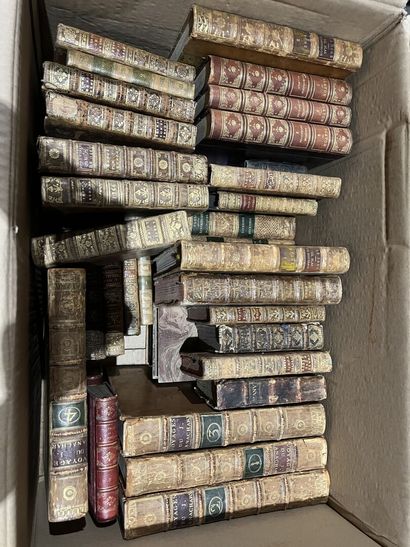 Bound and paperback books.
Eight boxes.