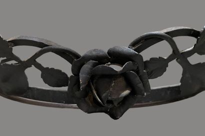 Deux pique-cierges en bronze doré et en laiton...