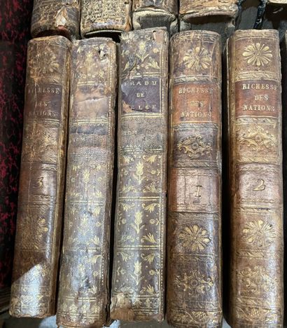 Bound and paperback books. 
4 boxes