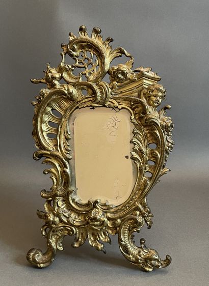 Gilt bronze table mirror with rocaille decoration.
19th...