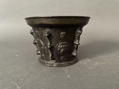 Mortar in patinated bronze decorated with...