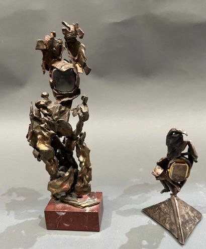 Two modern sculptures in patinated metal...