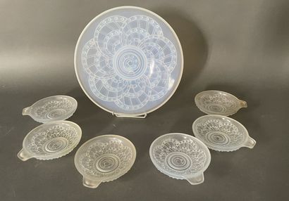 Pressed glass fruit service in a slightly...