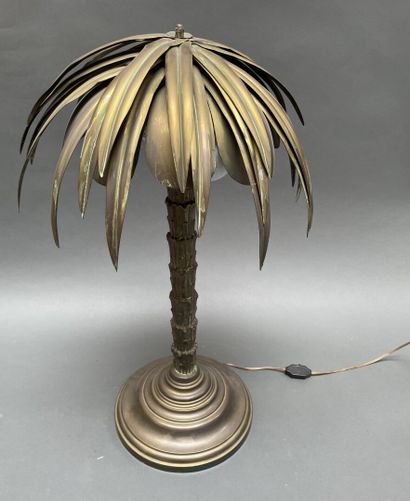 Five-light palm lamp, the bronze shaft resting...