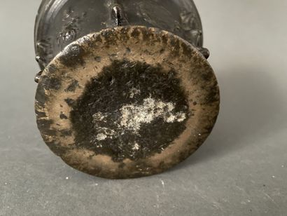 Mortar in patinated bronze decorated with...