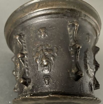 Mortar in patinated bronze decorated with...