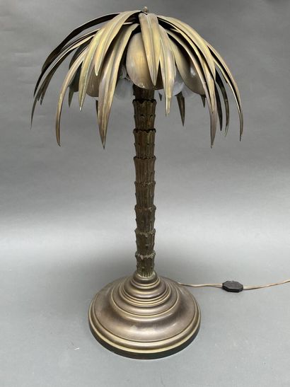 Five-light palm lamp, the bronze shaft resting...