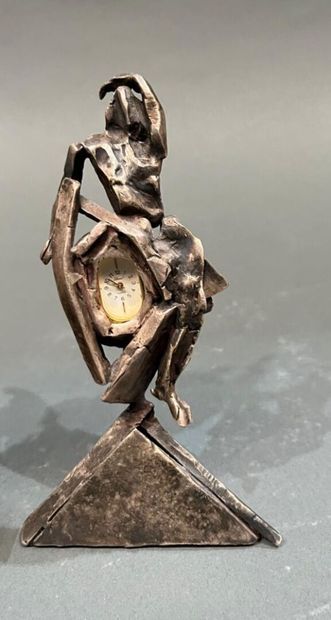 Two modern sculptures in patinated metal...