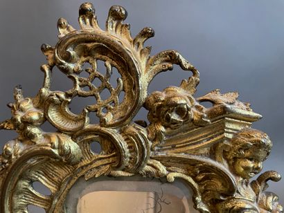 Gilt bronze table mirror with rocaille decoration.
19th...