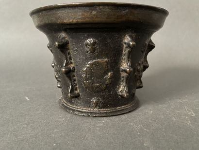 Mortar in patinated bronze decorated with...