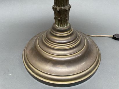 Five-light palm lamp, the bronze shaft resting...