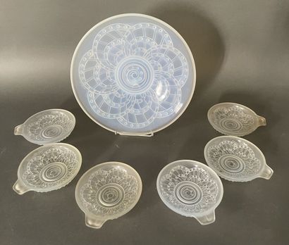 Pressed glass fruit service in a slightly...