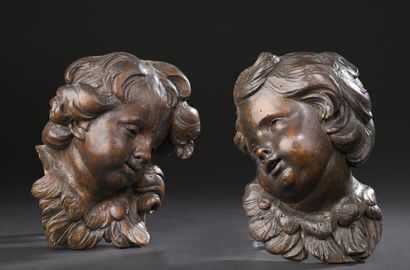 Pair of carved limewood heads representing...