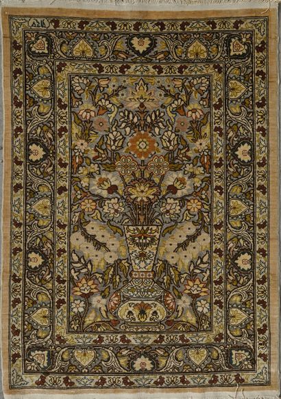 Héréké silk carpet embellished with metallic...