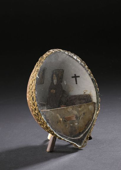 Nun's cell in a coconut containing a nun...