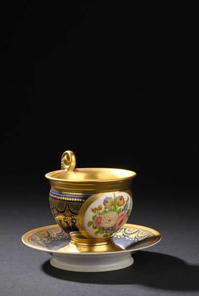 PARIS
Porcelain ovoid cup and saucer with...