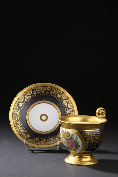 PARIS
Porcelain ovoid cup and saucer with...