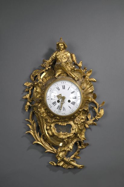 Gilt bronze wall-mounted cartel with a rich...