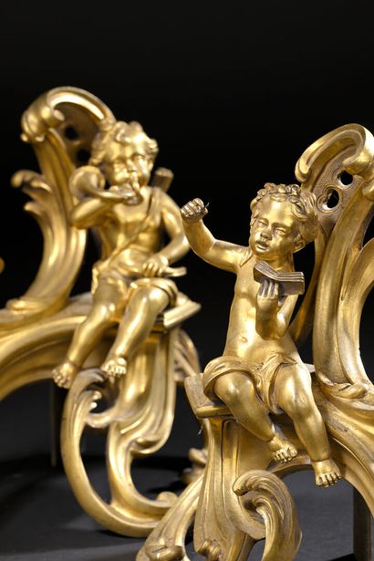 Pair of chased ormolu andirons in the form...
