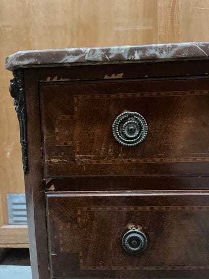 Veneered chest of drawers opening to three...