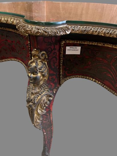 A Boulle-style red tortoiseshell veneered...