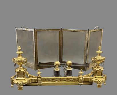 Gilt bronze hearth bar with vase decoration.
19th...