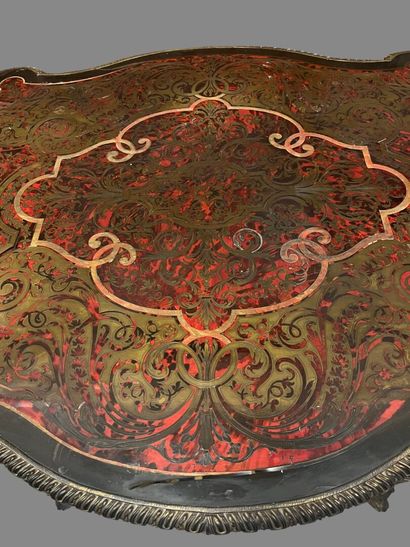 A Boulle-style red tortoiseshell veneered...