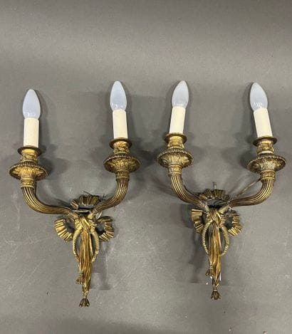 Pair of two-light ormolu sconces, the shafts...