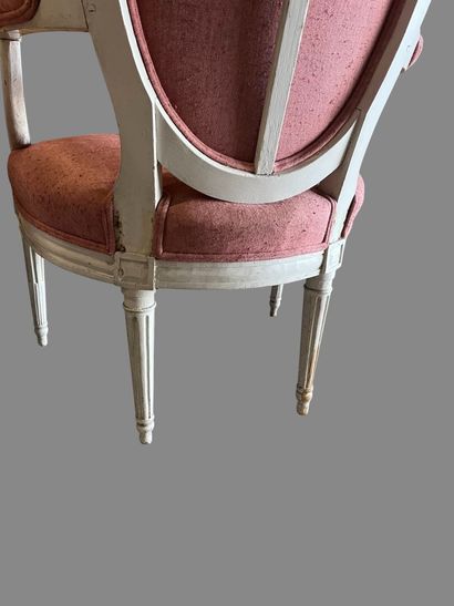 Suite of three white relacquered molded wood...