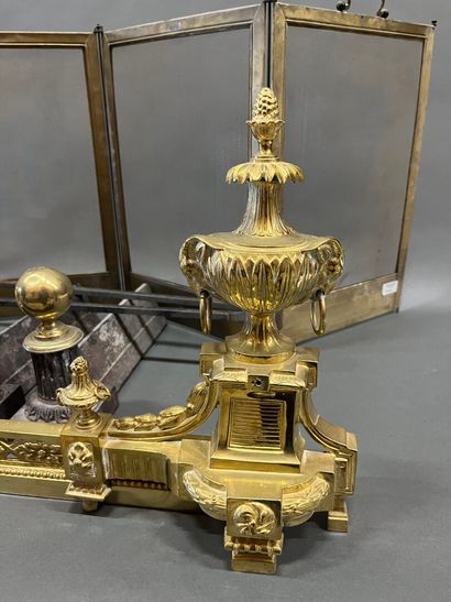 Gilt bronze hearth bar with vase decoration.
19th...