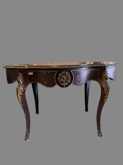 A Boulle-style red tortoiseshell veneered...
