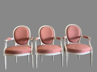 Suite of three white relacquered molded wood...