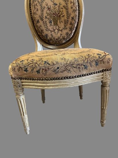 Pair of chairs in cream and molded varnished...
