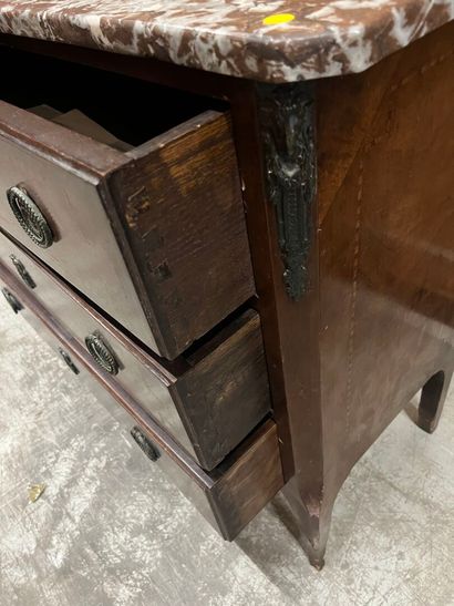 Veneered chest of drawers opening to three...