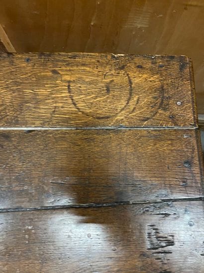 Chest of drawers in waxed oak with four molded...