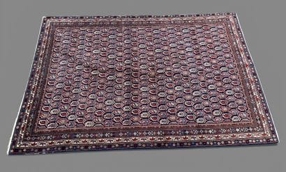 Wool carpet decorated with botehs.
Northern...